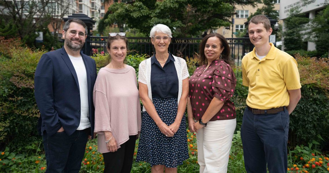 Members of the office, standing left to right: Patrick Corr, Rhonda Goldberg, Terri Edwards, Carmen Session, Alex Velto